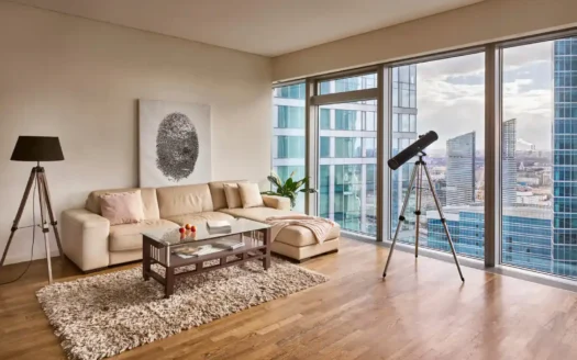 Apartment in a skyscraper with a view of city